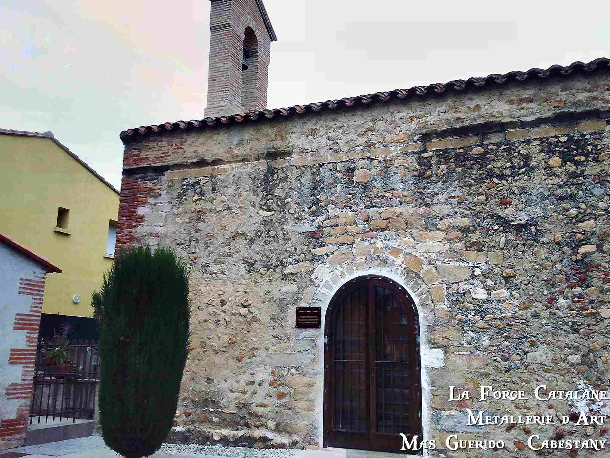 grille articulee entree eglise saleilles forge catalane.jpg